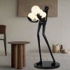 Human shape art sculpture holding ball floor lamp designer hotel living room lobby exhibition hall creative large body decoration